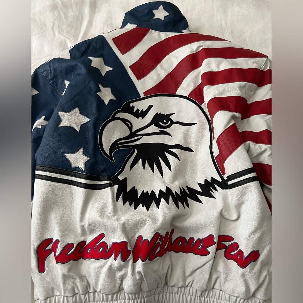 Vilanto white leather jacket with red and blue USA logo, size L.